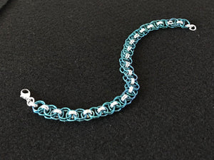 Silver and Niobium Bracelet with a Celtic Weave